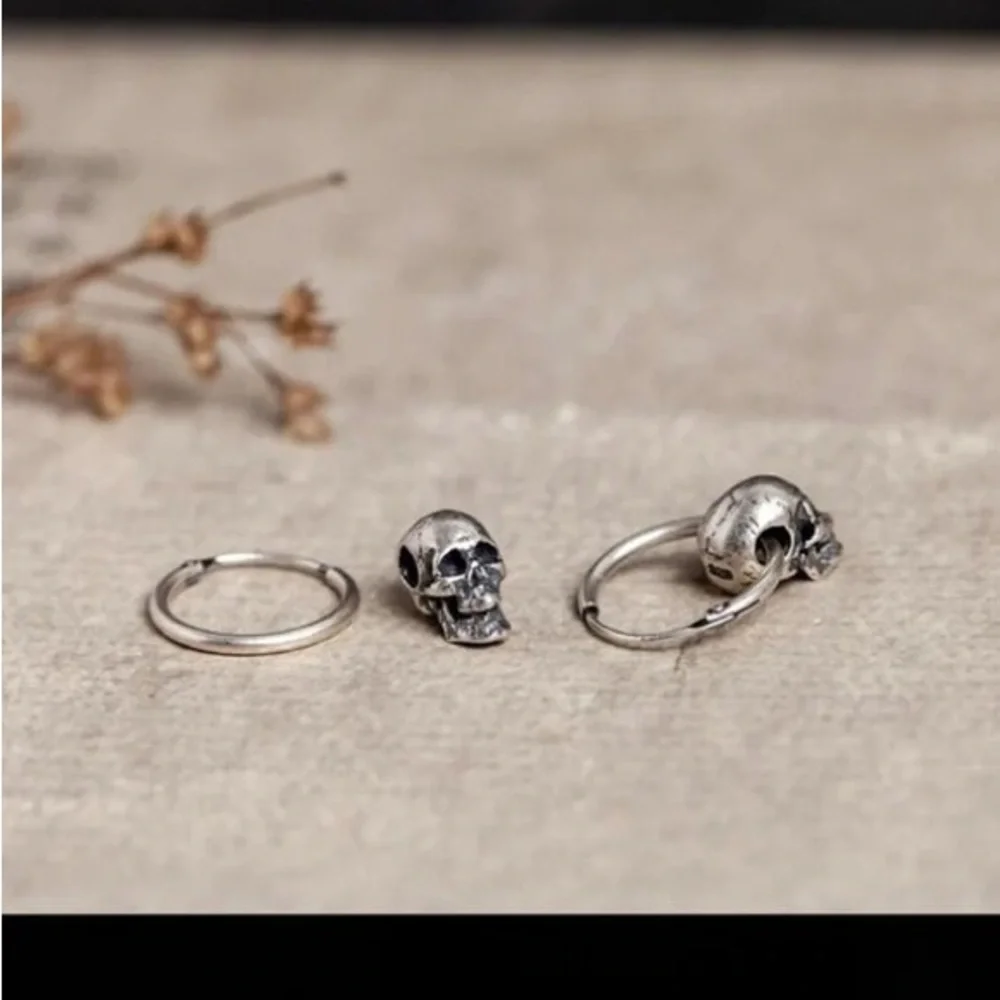 Single accent skull ear nail hip hop punk men's earrings S925 silver earrings